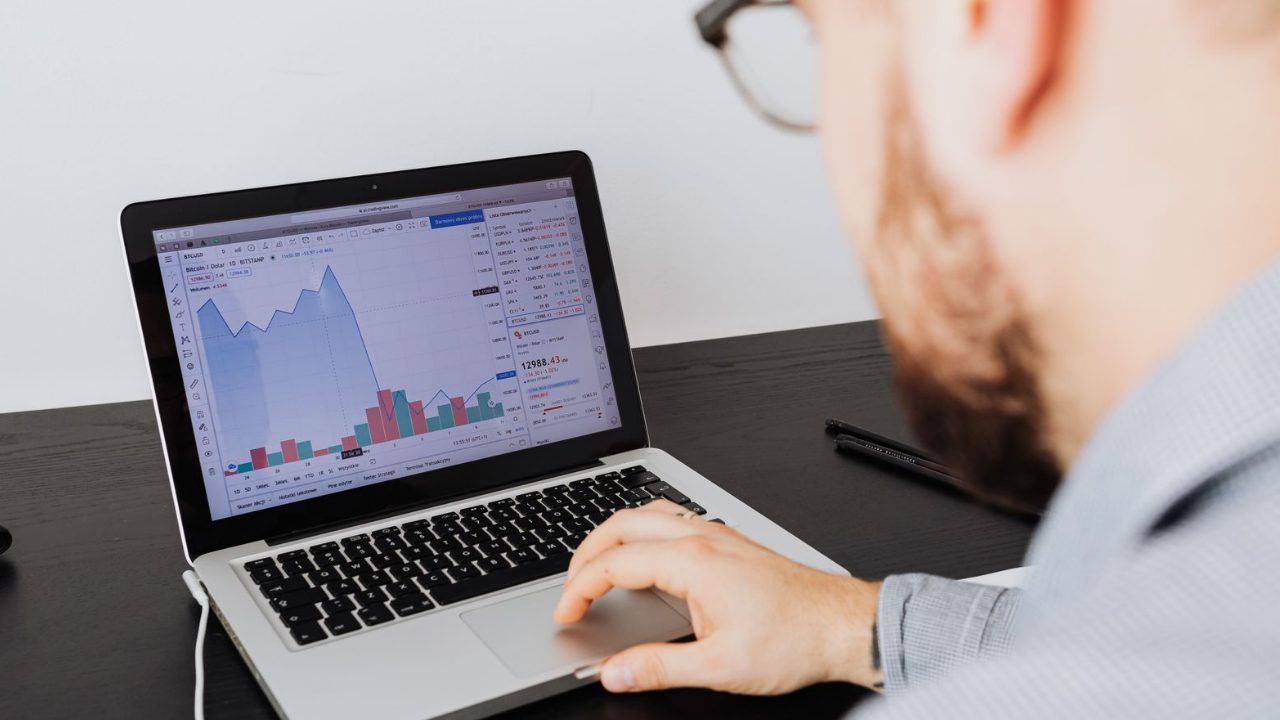 Reviewing website ranking data on a laptop